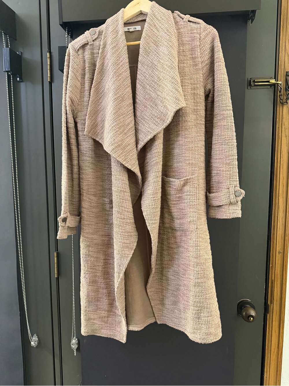 BB Dakota Revolution drape front trench coat in a textured boucle fabric.